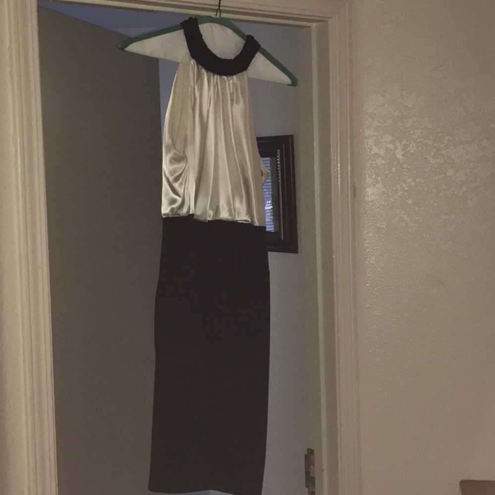 Women’s cocktail dress. Size 12 black and white satin